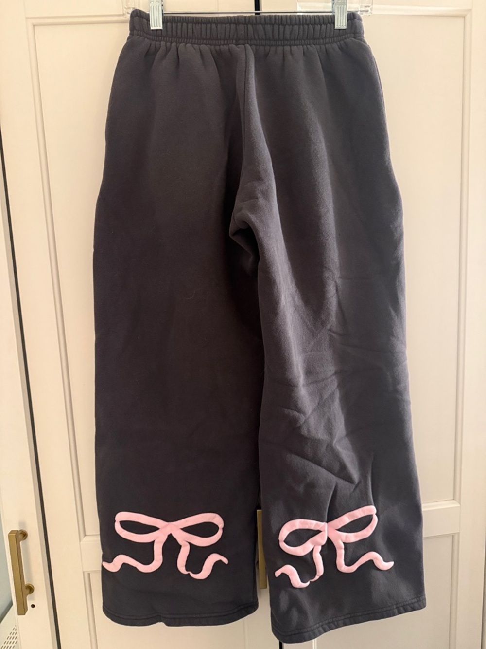 Edikted Wide Leg Pants in Black with Pink Bow Accents